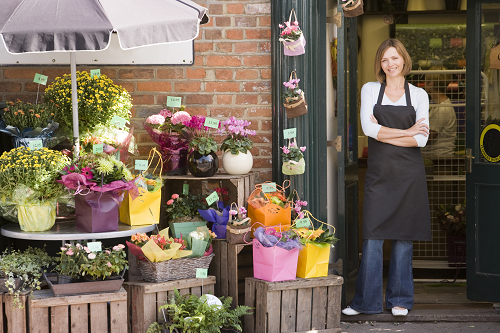 a business owner minding their storefront