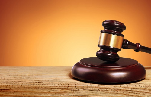 gavel with orange background